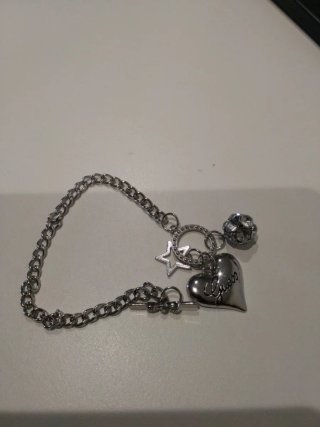 Pulsera Guess Corazón y Estrella Plata