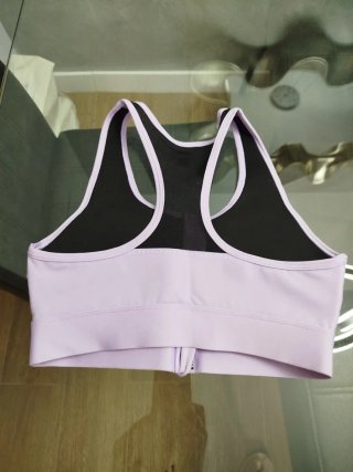 Top deportivo Puma cremallera morado
