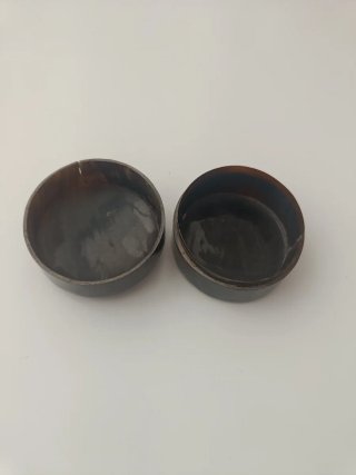 Lote de monedas antiguas en cajita