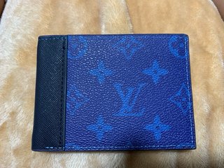 Cartera Louis Vuitton Azul y Naranja negociaable