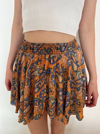 Minifalda de seda naranja con estampdo