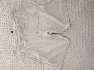 Pantalón corto felpa chico beige