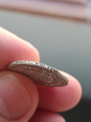 Preciosa moneda de Hércules