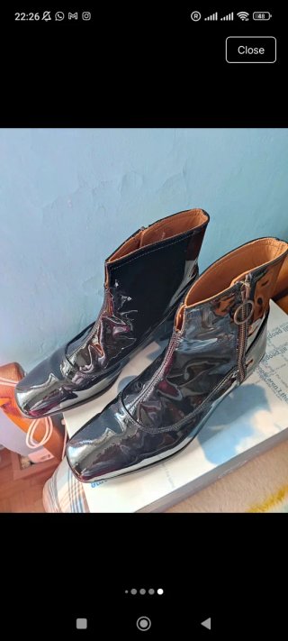 Botas de piel negras estilo años 60