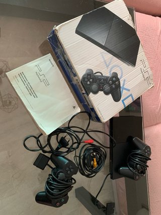 Lote PS2: Volante, Mando y Singstar