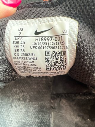 Zapatillas Nike Negras con detalles Naranja