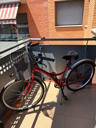 Bicicleta urbana roja + candado U Btwin + herramie
