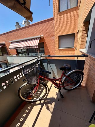 Bicicleta urbana roja + candado U Btwin + herramie
