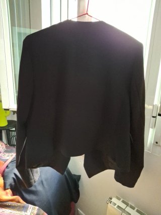 Chaquetilla torera negra poliéster con bolsillos