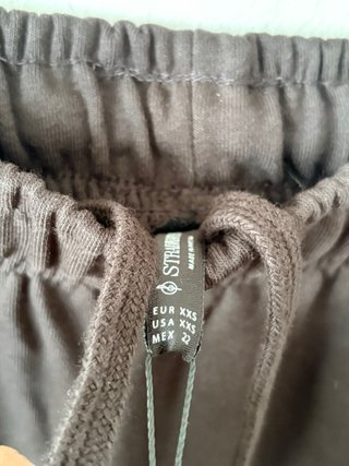 Pantalón fluido negro recto holgado Stradivarius