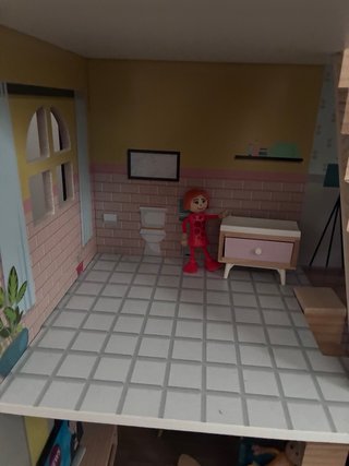Casa de muñecas de madera