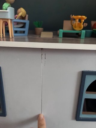 Casa de muñecas de madera