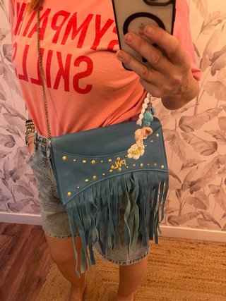 Bolso de piel turquesa con flecos