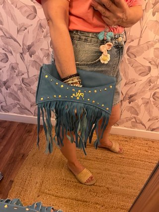 Bolso de piel turquesa con flecos