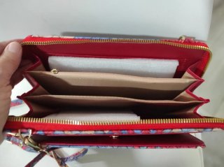 Bolso de mano tejido con logo brillante