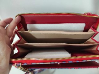Bolso de mano tejido con logo brillante