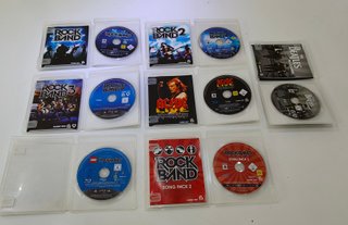 PS3 Super Slim +Lote Juegos Rock Band/ Guitar Hero
