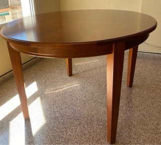 Mesa ovalada extensible de madera