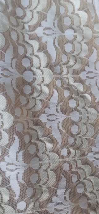 Tela de encaje para cortinas beige y blanco