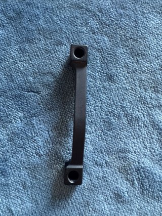 Adaptador pinza de frenos bicicleta 20mm