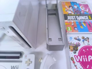 Consola Nintendo Wii + Juegos y Accesorios