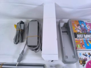 Consola Nintendo Wii + Juegos y Accesorios
