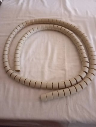 Porta cables espiral beige