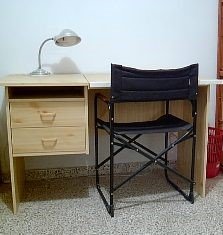 Silla plegable negra de tela