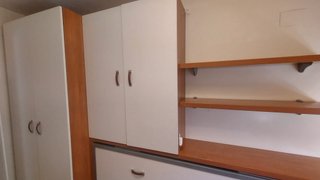 Dormitorio juvenil con cama abatible blanco
