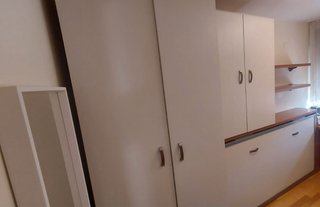 Dormitorio juvenil con cama abatible blanco