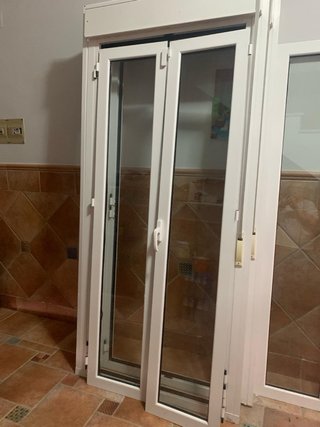 Puerta Balconera con persianas