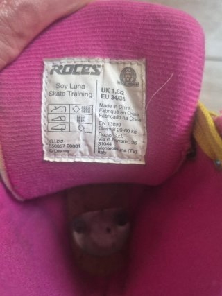 Patines de 4 ruedas rosas y amarillos