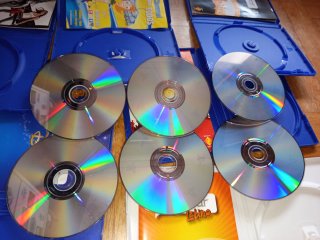 Micrófonos SingStar +  6 Juegos Karaoke PS2