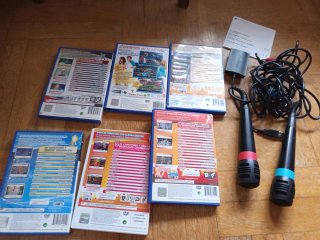 Micrófonos SingStar +  6 Juegos Karaoke PS2