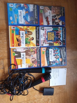 Micrófonos SingStar +  6 Juegos Karaoke PS2