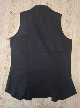 Blusa sin mangas con volantes