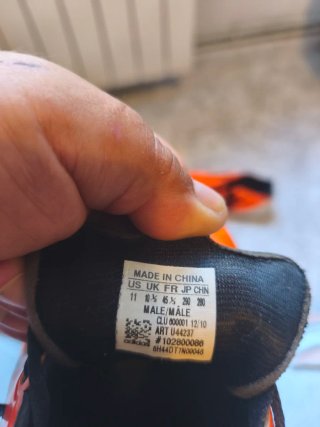 Zapatillas de fútbol Naranja y Negro