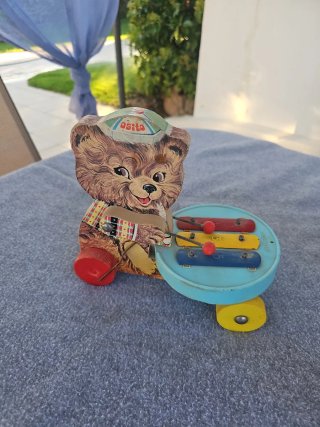 Juguetes antiguos de hojalata y madera el oso
