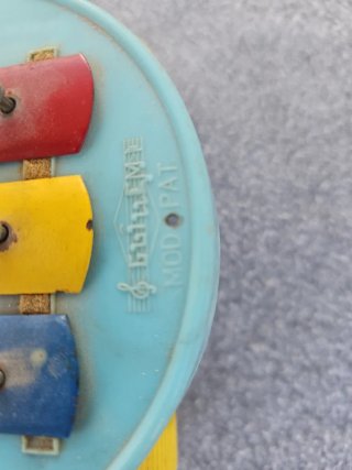 Juguetes antiguos de hojalata y madera el oso