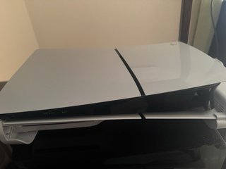 PS5 Slim con lector, soporte y 4 juegos