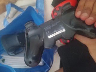 Mando PS3 Sony Negro y rojo
