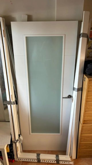 Puerta interior blanca con cristal