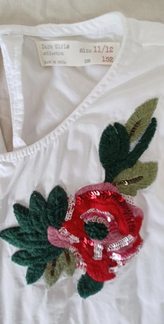 Camisa blanca niña 11-12 años con flor roja