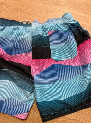 Bañador chico rayas azul y rosa