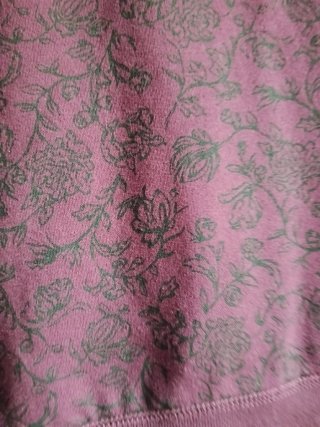 Sudadera con cremallera y estampado floral