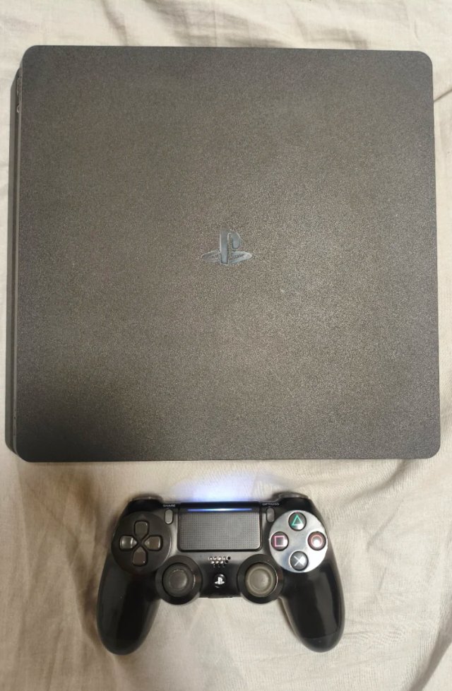 PS4 (PlayStation 4) 1 Tera + Mando original.