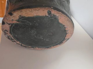 Jarrón antiguo decorado con peces