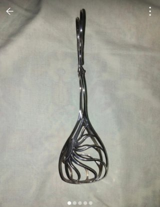 Pinzas de plata con diseño calado