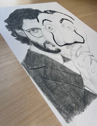 El profesor dibujo a grafito.