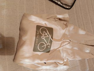 Sudadera beige con estampado de bicicleta